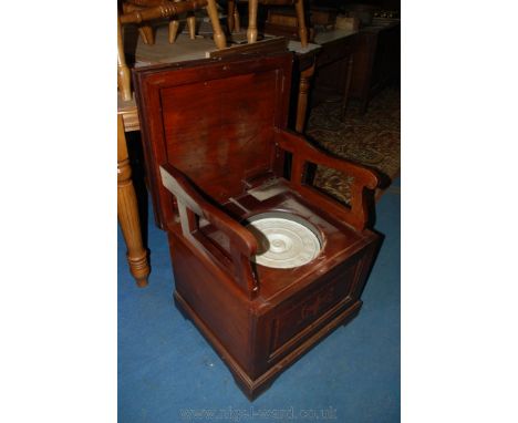 A Commode Chair with inlaid folding top.