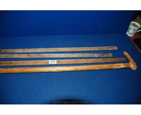 A Walking Stick and three Yard Measures