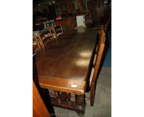 A good reproduction Oak Refectory style Dining Table having thick three plank top with cleated ends and on heavy turned legs 