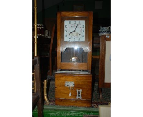 A Clocking-in Clock by 'Blick National Time Recorder & Co Ltd', with key