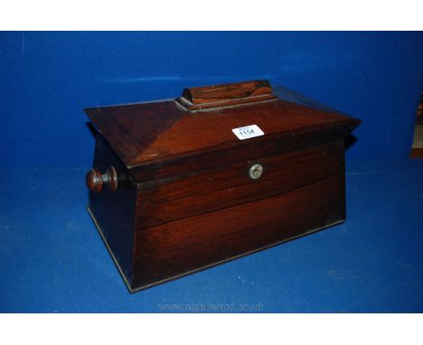 A Sarcophagus Tea Caddy with glass bowl.