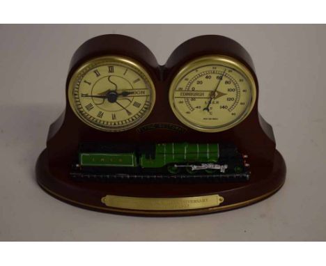 Reproduction teak framed mantel clock of The Flying Scotsman's 90th anniversary of 24  February 1923, together with barometer