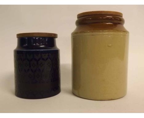 Vintage stone storage jar with treen lid, and a further Hornsea blue glazed storage jar with  treen lid, 20cms and 15cms (2)