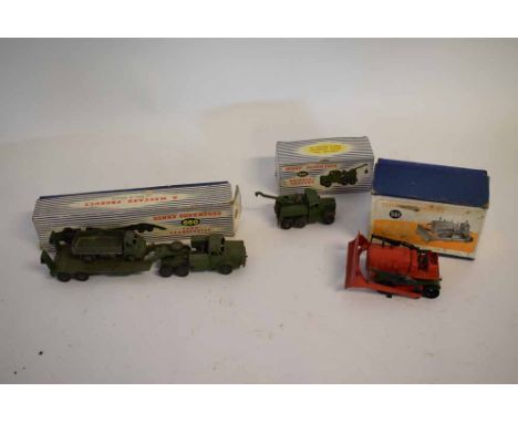 Three boxed Dinky Toys models to include a tank transporter model no 660; a further  recovery tractor model no 660, and a Bla