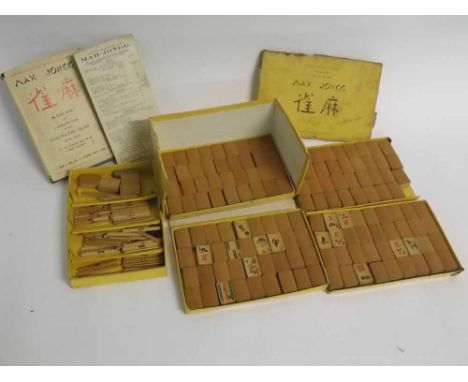 Cardboard cased vintage Mah Jong set with bamboo pieces, complete with instruction  book 