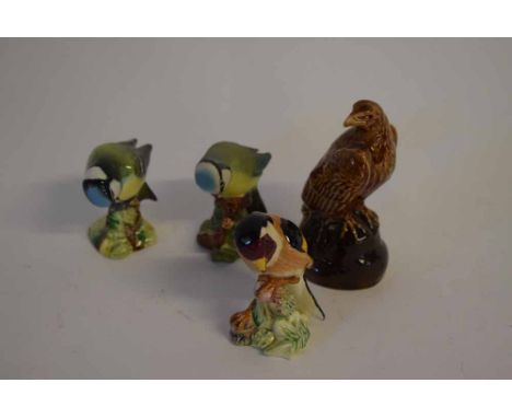 Group of four Beswick birds: Beneagles Scotch Whisky, decanter of an eagle, 10cms tall  (empty); Blue Tit, 7cms tall; Blue Ti