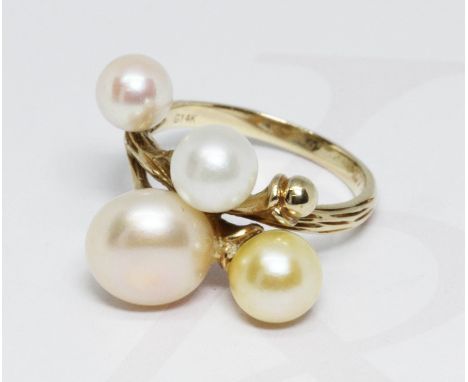 A cultured pearl cluster ring, marked 'G14K', gross weight 6.2g, size O.  
