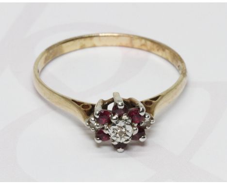 A hallmarked 9ct gold diamond and ruby cluster ring, the cluster measuring approximately 9.57mm x 7.84mm, gross weight 2g, si
