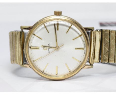 A gold plated Omega wrist watch, ref. 131.019, cal. 601, circa 1960s, case diameter 34mm, gold plated Fixo-Flex strap. Condit
