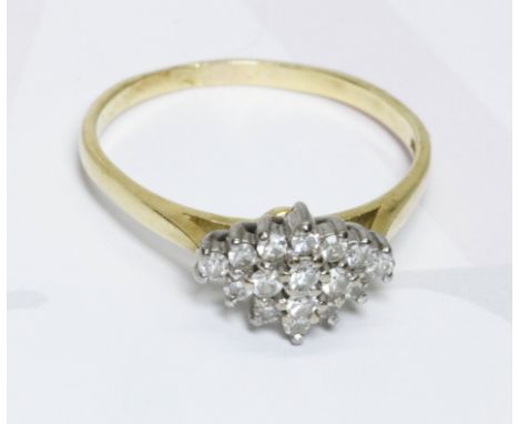 A hallmarked 18ct gold diamond cluster ring, the rhomb shaped cluster measuring approximately 11.69mm x 8.34mm, gross weight 