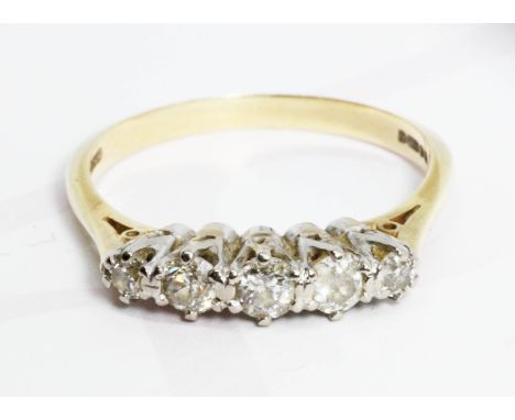 A five stone diamond ring, total approximate diamond weight 0.46 carats, hallmarked 18ct gold band, gross weight 2.8g, size N