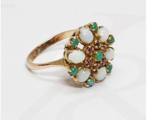 A garnet, opal and turquoise cluster ring, the cluster measuring approximately 17mm in diameter, yellow metal band and settin