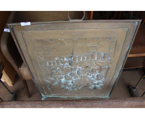 A brass fire screen 