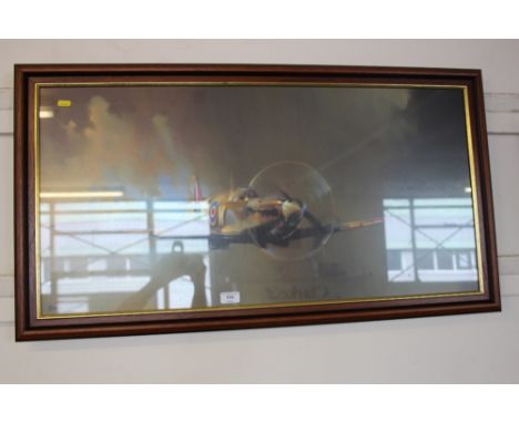 A framed print depicting a spitfire, after Barry A.F Clarke