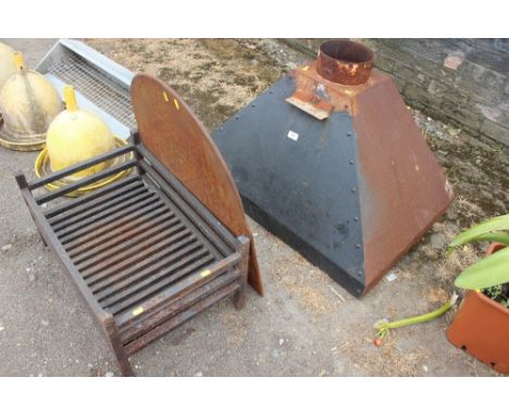 A cast iron fire back; fire grate and hood