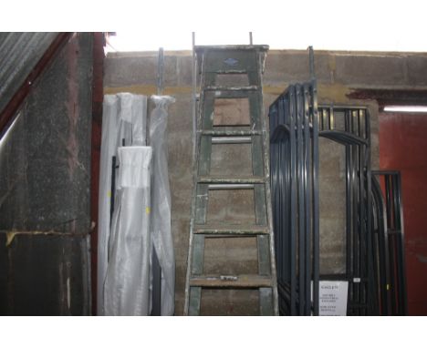 A wooden step ladder and one other 