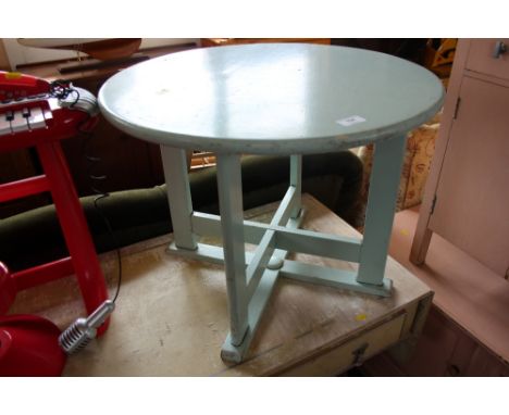 A light blue painted table 