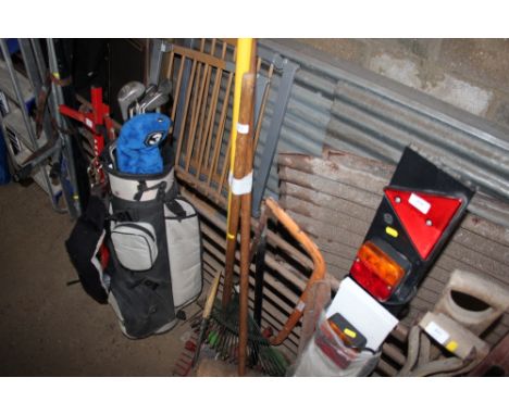 A quantity of long handled gardening tools 