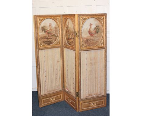 A giltwood and gesso three-division room screen with oval tapestry panels of cockerels and birds, height 150cm