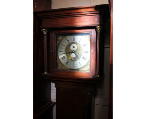 An 18th century oak longcase clock, the square dial with gilt spandrels and silverised face with Roman numerals, marked John 