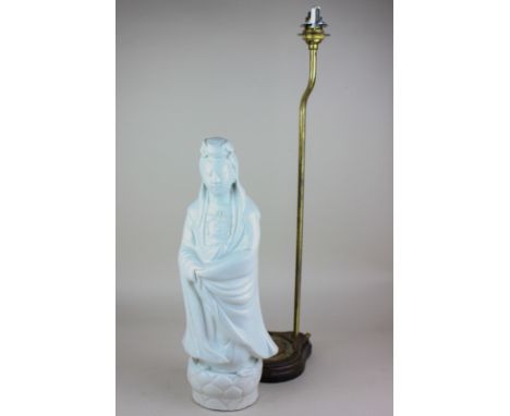 A Chinese pottery blanc de chine figure of a deity, previously as a lamp base, now detached, 36cm high