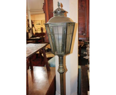 A brass 'streetlight' standard lamp, with knopped column support and circular base, 160cm high