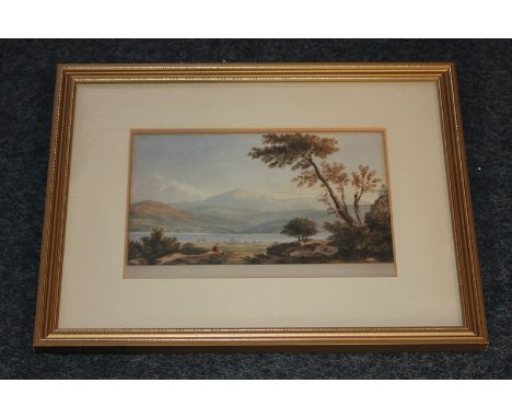 A 19th century landscape with figure seated foreground looking across a lake towards distant mountains, watercolour, monogram