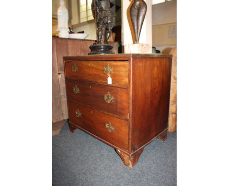 A small mahogany chest of three graduated drawers with brass drop handles, on bracket feet, 78cm