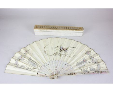 A lady's fan, decorated with lovers and cupid in a garden, with mother of pearl guards, in box marked Duvelleroy, London
