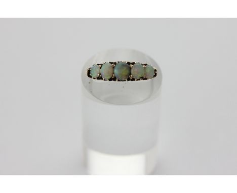 An opal five stone ring 