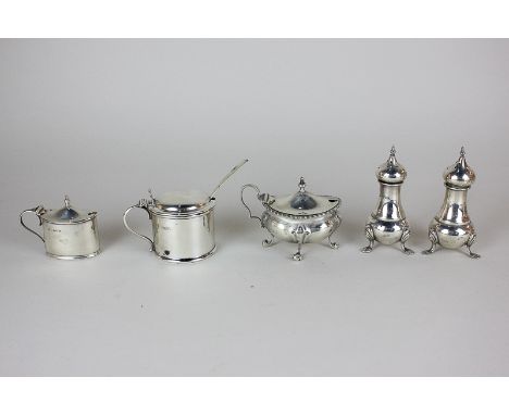 A George V silver mustard, maker Edward Barnard &amp; Sons Ltd, London 1912, together with a pair of silver peppers, two silv