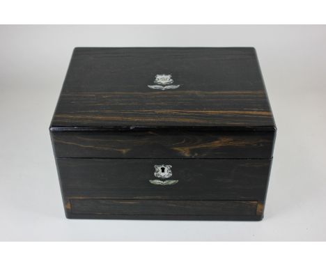 A 19th century rosewood sewing box, inlaid with mother of pearl floral cartouche (monogrammed) with secret drawer and missing