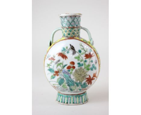 A Chinese pottery moon flask with bright enamel design of birds in foliage, the floral surround with yellow ground, character