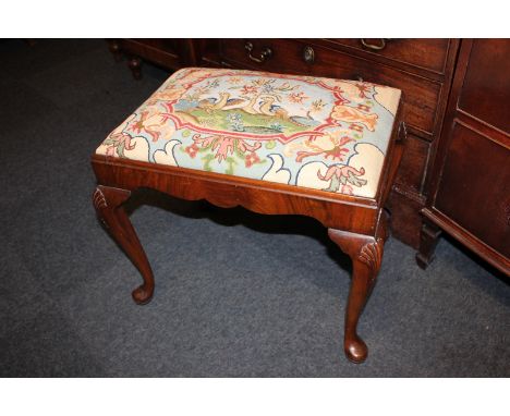 A walnut tapestry seated rectangular stool on shell carved cabriole legs, 57cm 