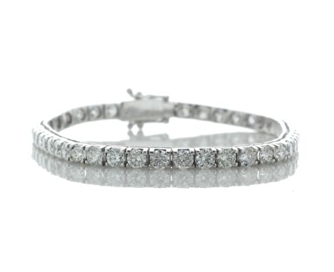 Forty six round brilliant cut diamonds are set in this stunning box style tennis bracelet. 7 inches in length. Item Specifica