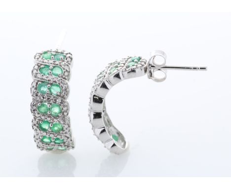Sterling silver emerald Earrings, set with twenty eight round emeralds. Item Specifications: Clarity: . Metal: Silver. Condit