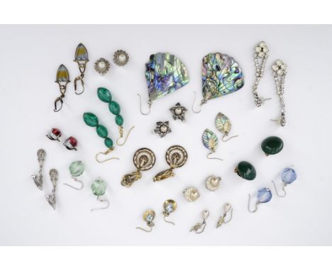A group of vintage costume earrings, including ear pendants and clips, second quarter 20th Century