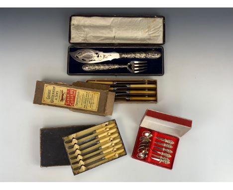 A cased set of Victorian electroplate fish servers together with three boxed sets of vintage cutlery