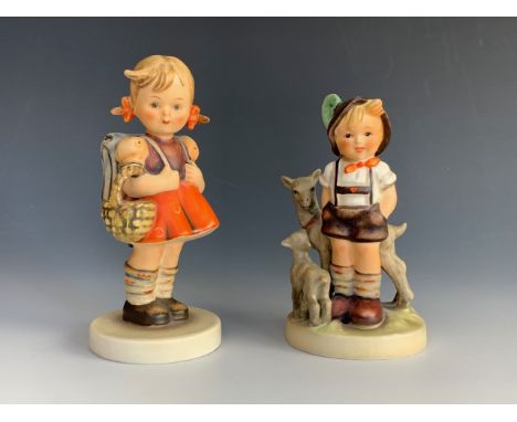 A Hummel 'Goat Herder' figure and one other, tallest 14 cm.