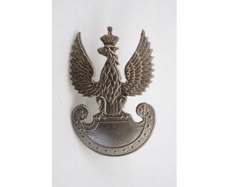 A Second World War Free Polish Army cap badge
