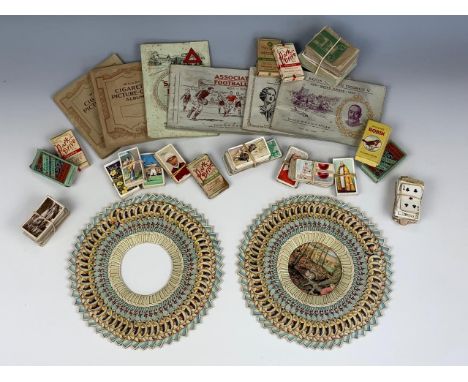 A large quantity of vintage cigarette card albums and cards