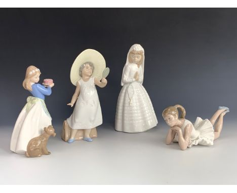 Four Nao figurines; a ballerina, "First Holy Communion" and two others, tallest 23 cm 