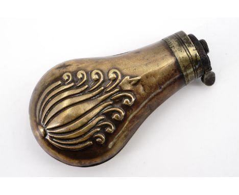 A Victorian copper pistol powder flask, decorated with an embossed anthemion device, 9.5 cm