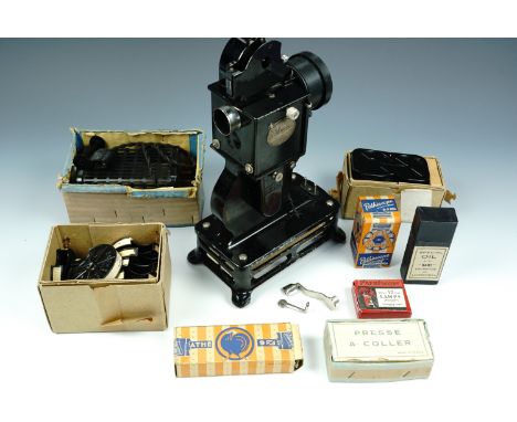 A 1920s Pathescope film projector and accessories