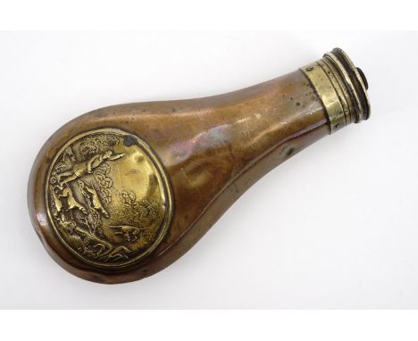 A Victorian Sykes' patent powder flask, faced with an embossed brass plaque depicting a hunting scene