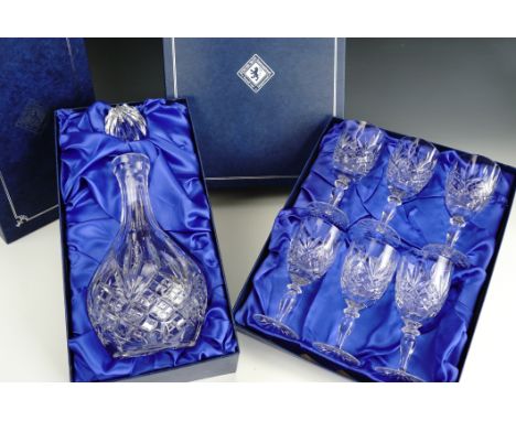A boxed Edinburgh Crystal decanter and six wine glasses