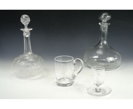A contemporary free blown ship's decanter, a Victorian finely cut shaft and globe decanter and wheel cut golfing tankard etc.
