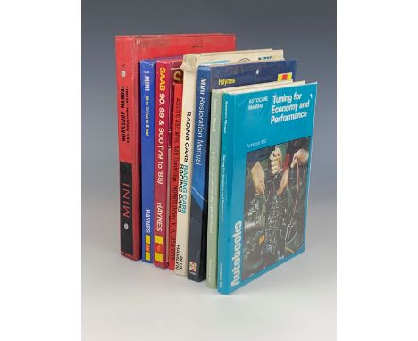 A BMC Mini workshop manual, circa 1960s, together with other classic car / automotive handbooks etc