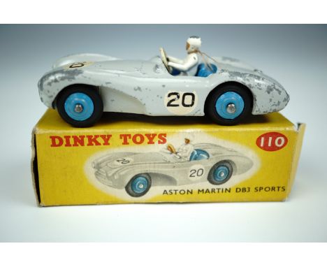 A Dinky Toys 110 DB3 Aston Martin sports car, in light grey with blue interior, in original carton