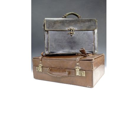 A gentleman's vintage leather box briefcase, with integral filing system and writing desk, 45 x 16 x 32 cm high, together wit